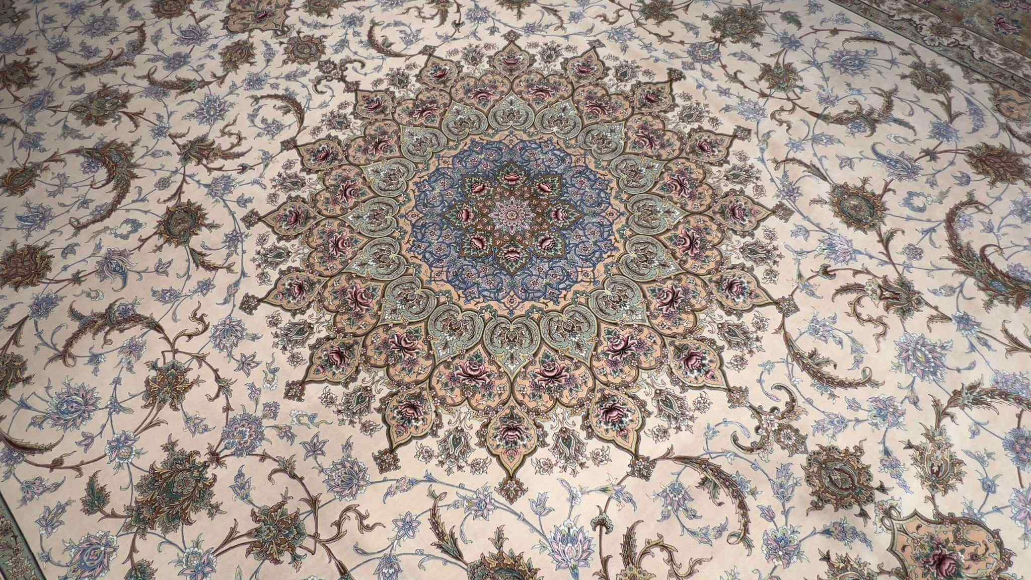 "Elegant floral Persian rug, handmade in Isfahan, showcasing Persian cultural heritage and craftsmanship."